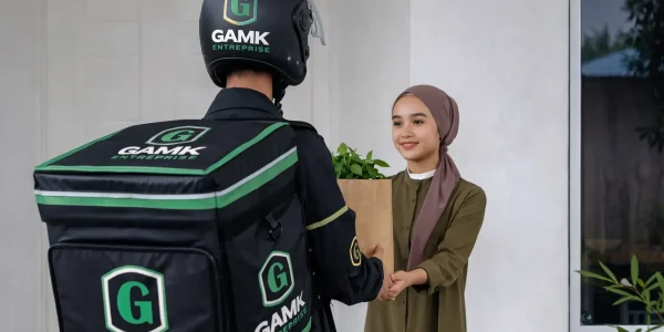 Delivery man handing plants to woman